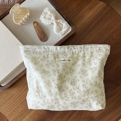 Wudygirl travel cosmetic bag zipper closed detail shows secure portability.