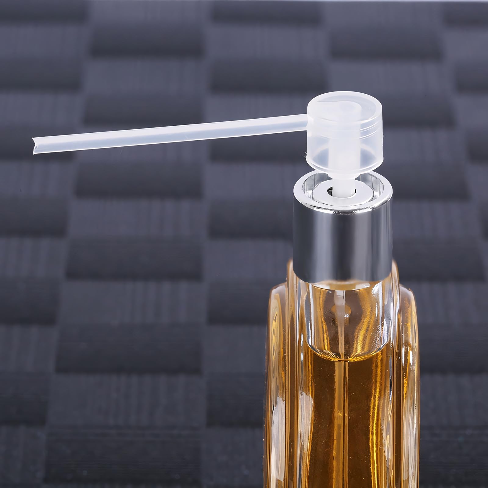 WXS-CHALL dispenser pump provides controlled fragrance dispensing.
