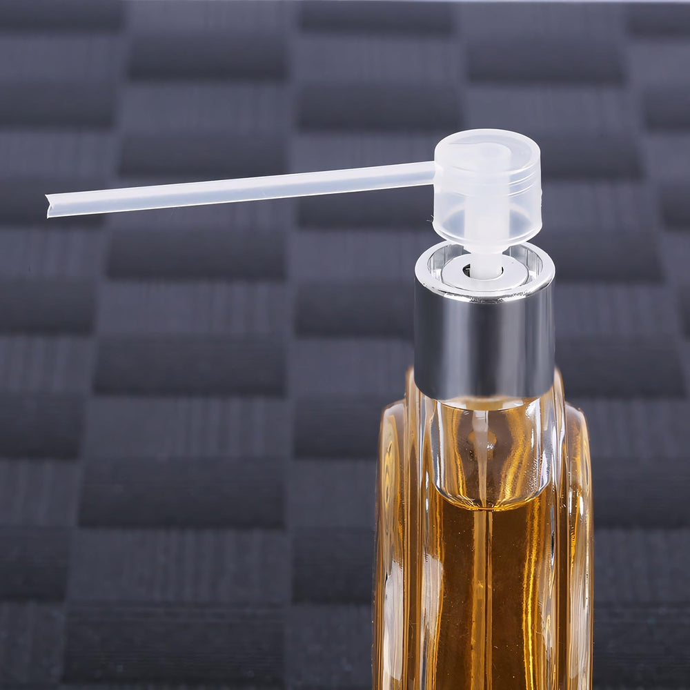WXS-CHALL dispenser pump provides controlled fragrance dispensing.