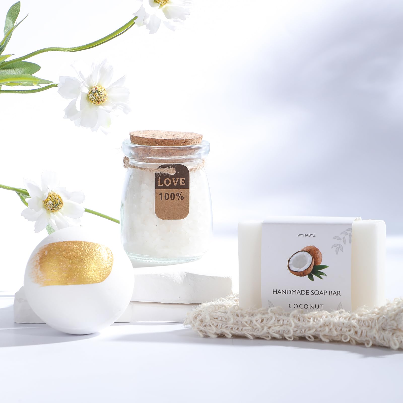 WYHABYZ Coconut Bath Bomb creating a relaxing, tropical soak.