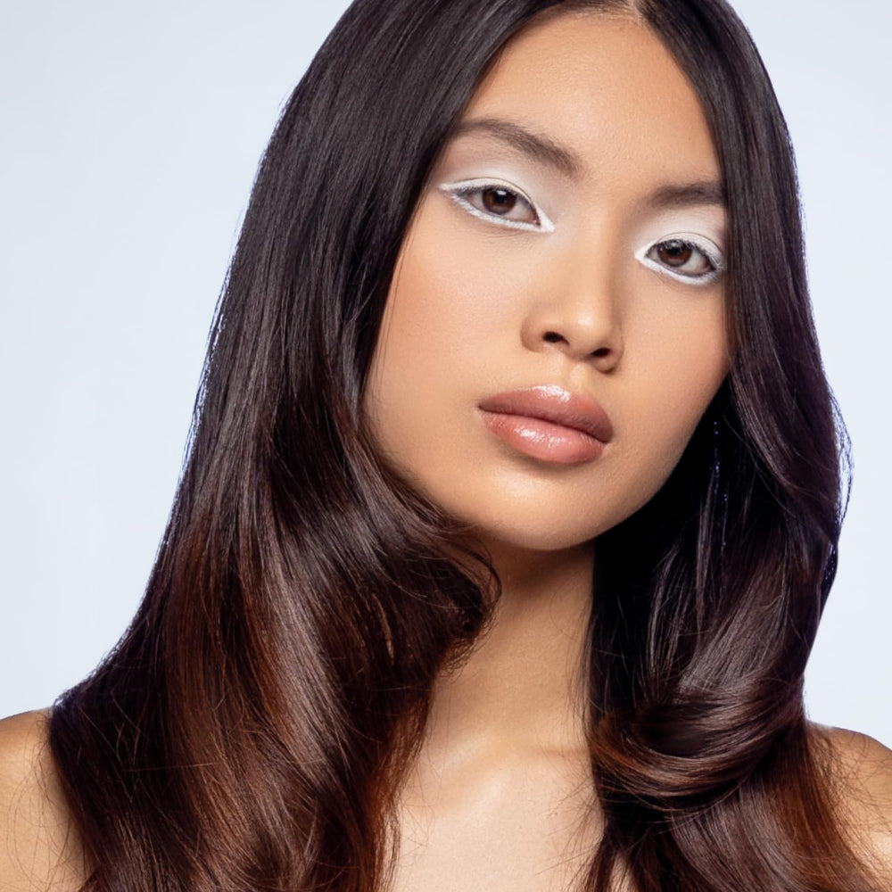 XMONDO Heat Shield mist on hair delivering lightweight protection and shine