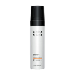 XMONDO Wave Foam bottle closeup, vegan formula for defined, frizz-free waves.