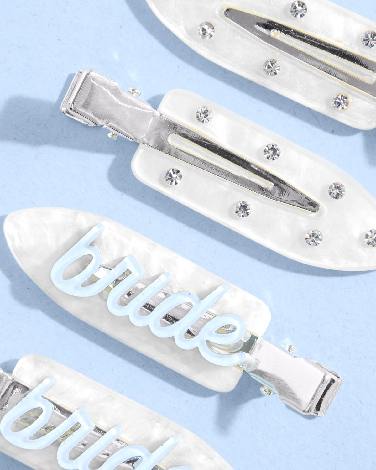 xo, Fetti rhinestone clip sparkles for photo-ready bridal moments.