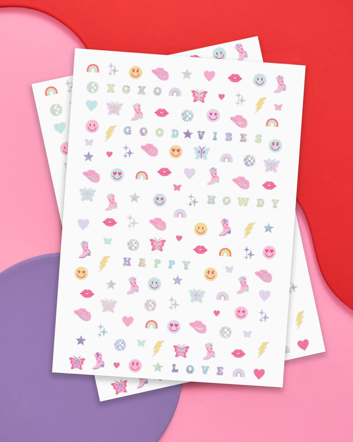 xo, Fetti nail stickers rainbows butterflies and smilies for party vibes.
