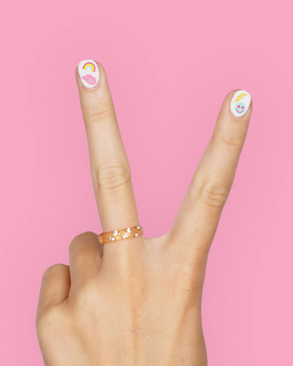 xo, Fetti party nail stickers sheets and packaging ready for display.