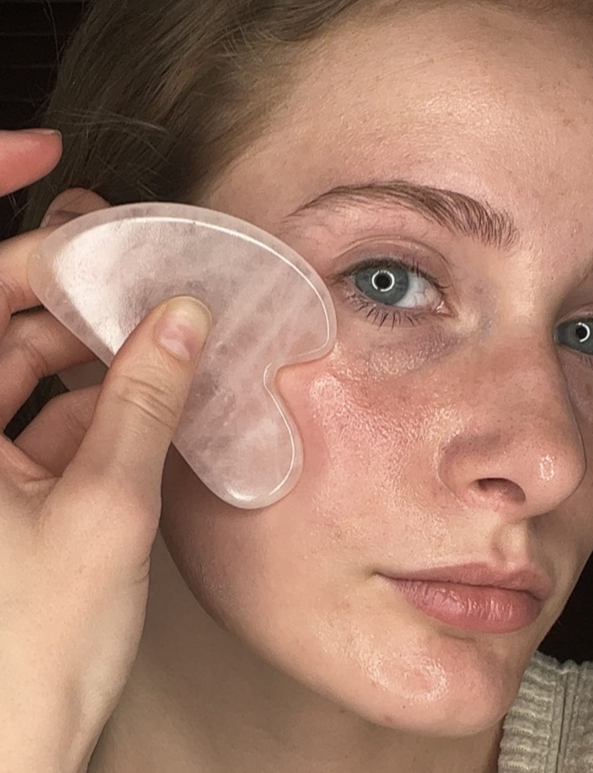 XYZ Skin Gua Sha Glide applied to skin, demonstrating slip for massage.