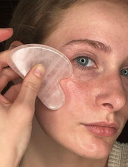 XYZ Skin Gua Sha Glide applied to skin, demonstrating slip for massage.