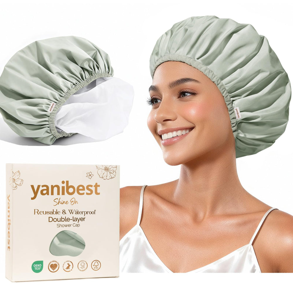 YANIBEST waterproof double-layer shower cap with secure non-slip elastic band for dry hair during showers.