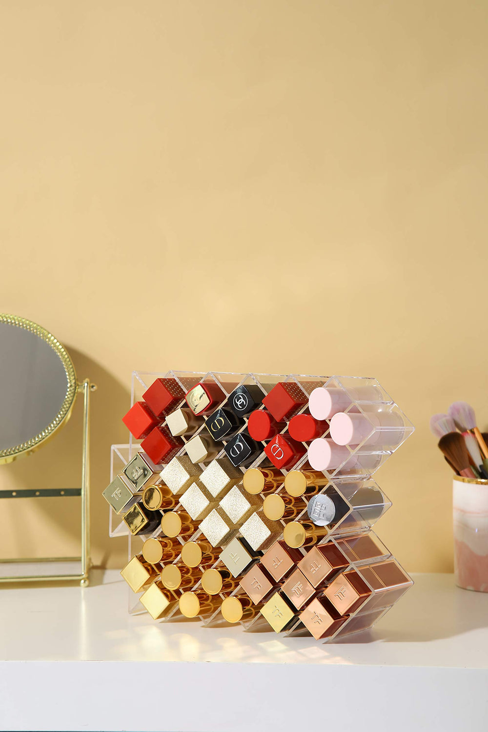 YIEZI lip gloss storage stand holds lip gloss and brushes.