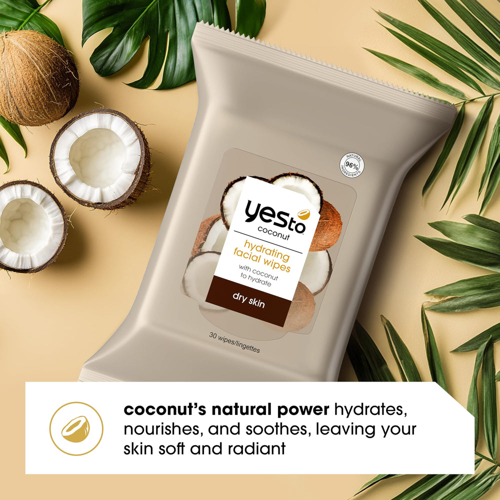 Yes To Coconut cleansing wipes removing makeup from face, neck, and hands.