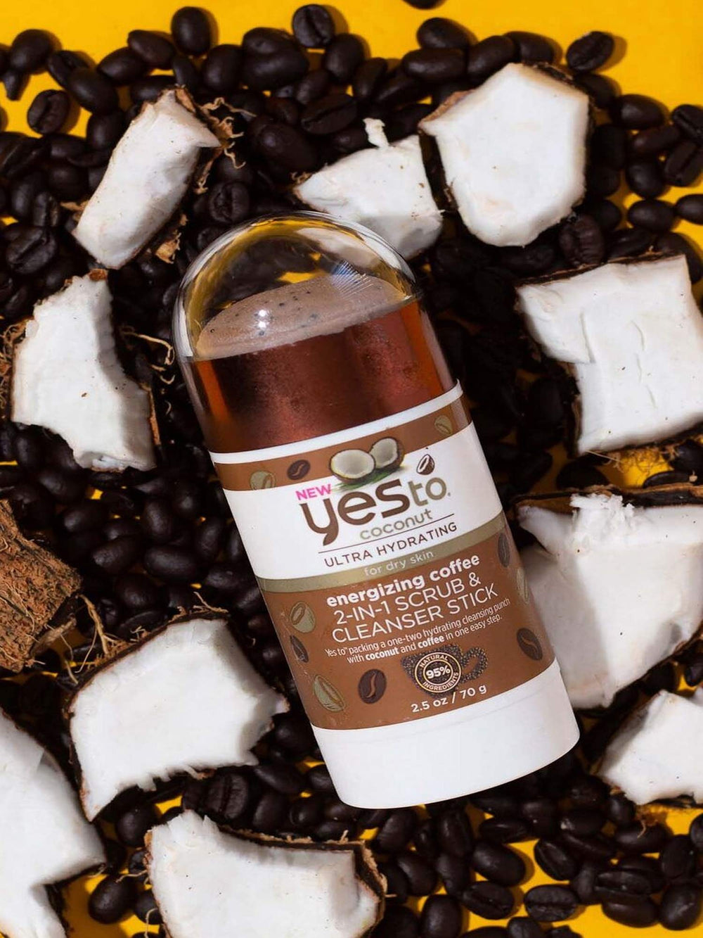 Yes To Coconut Coffee stick natural ingredients close-up featuring coconut oil and coffee extract.