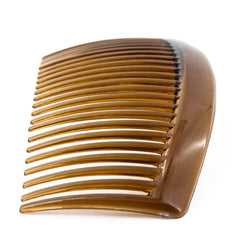 Yeshan brown plastic side comb blending with hair for discreet hold.