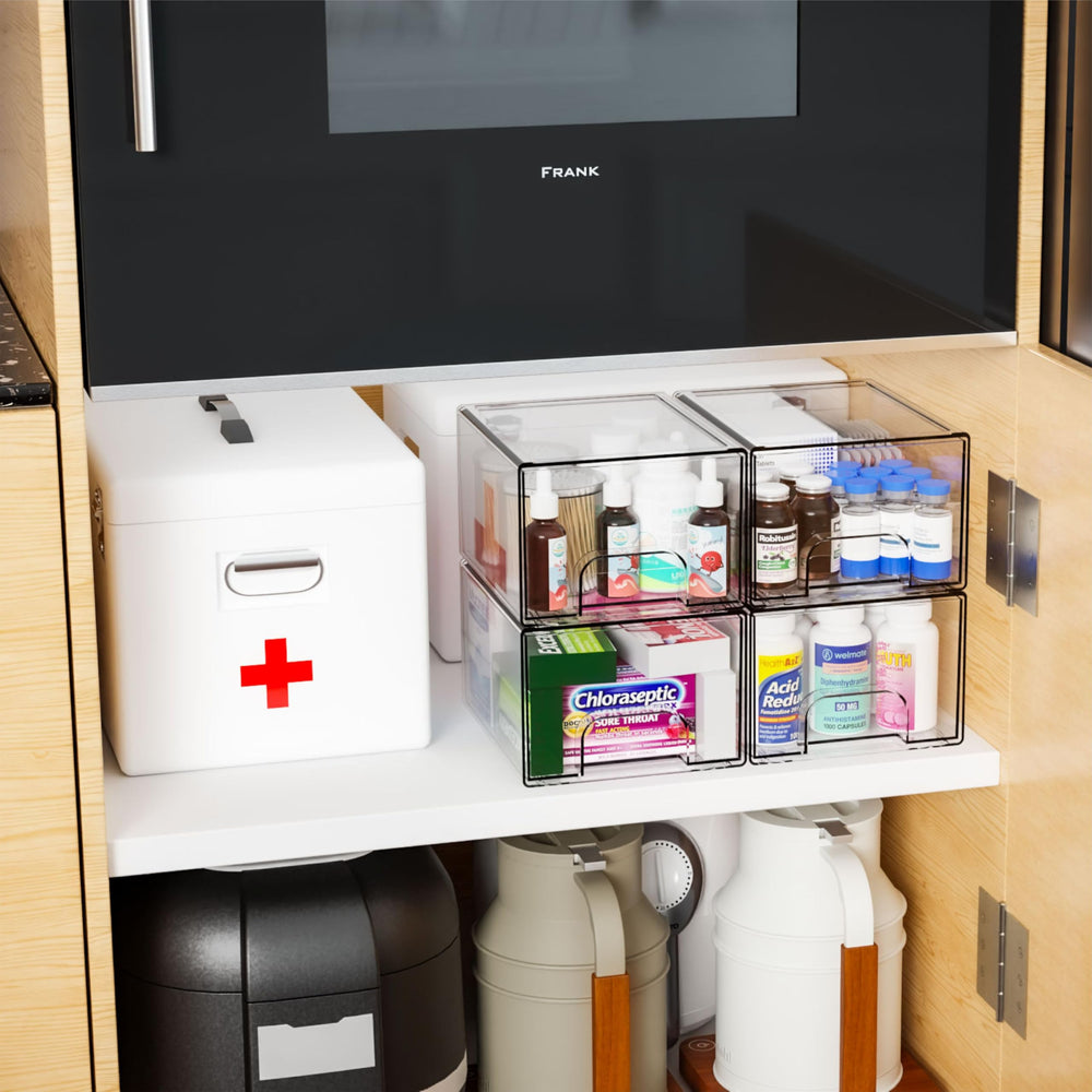 Yieach stackable organizers in a medicine cabinet for orderly storage.