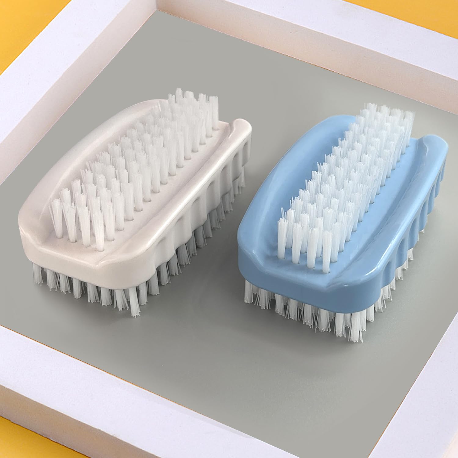 Ylijxqc nail brush two-pack in blue and white for home and travel tasks.