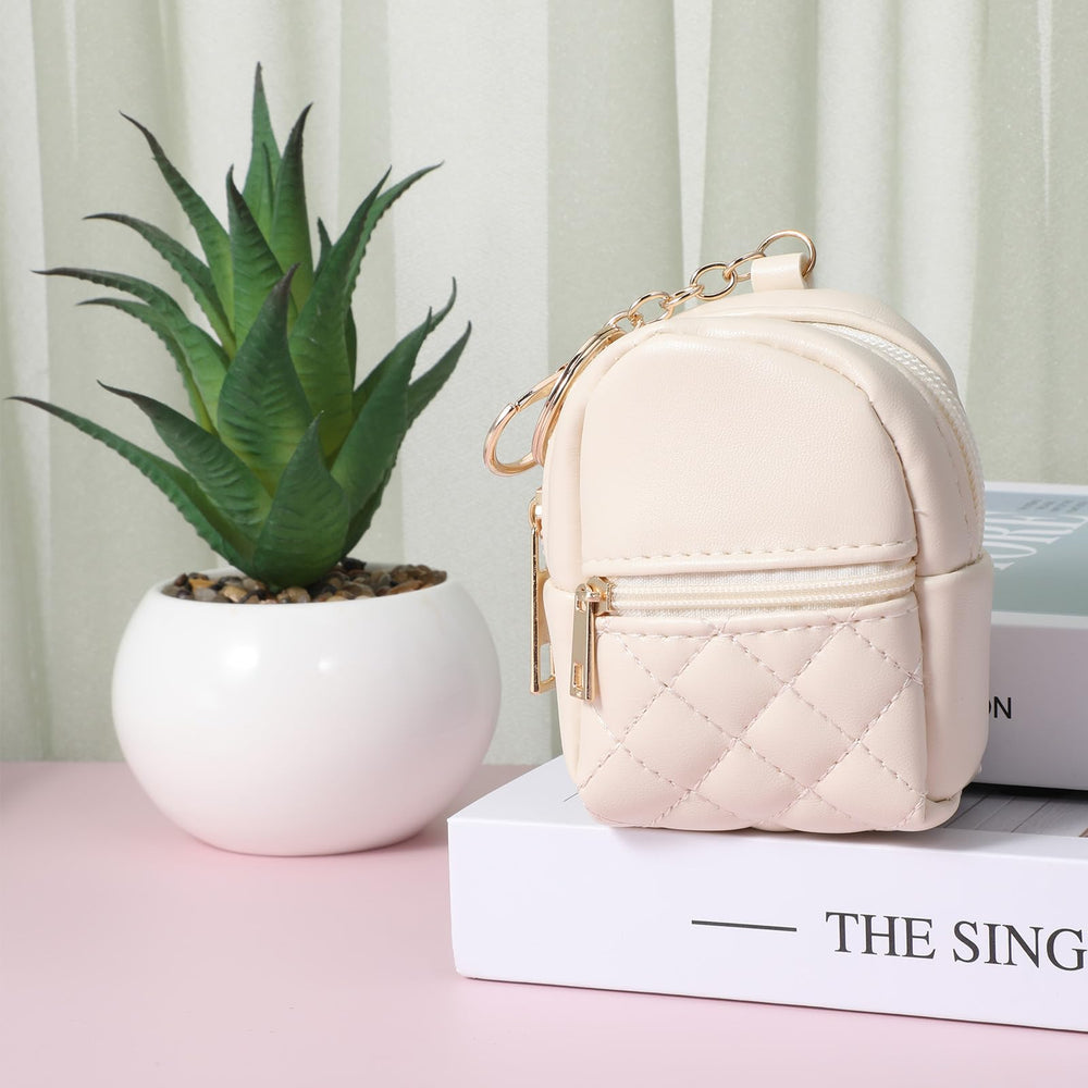 Ymapinc mini backpack keychain beige attached to bag in use