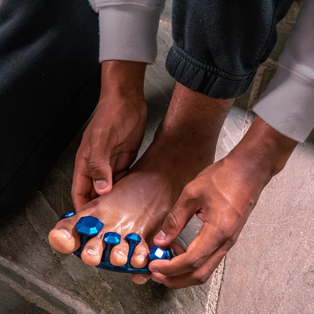 YogaToes Gems for Men set in gym bag suggests on-the-go relief after long shifts.