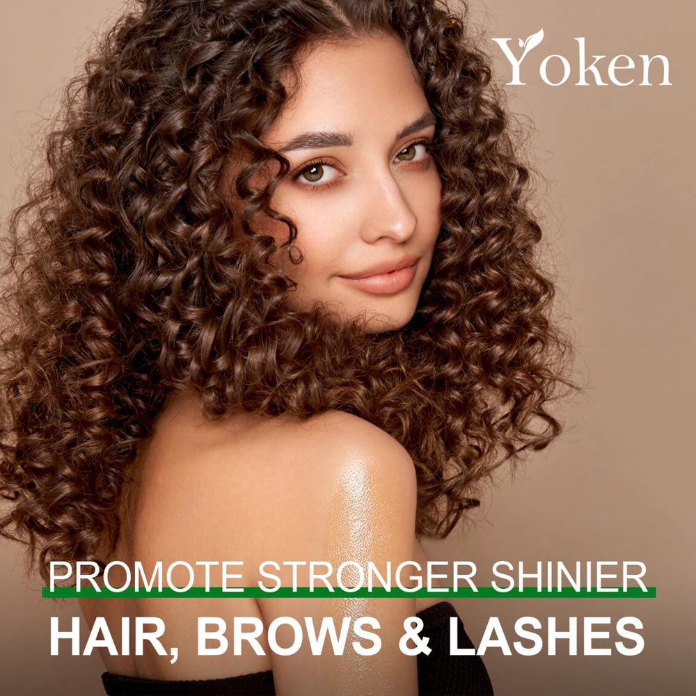 Yoken castor oil on hair and nails demonstrates daily conditioning routine
