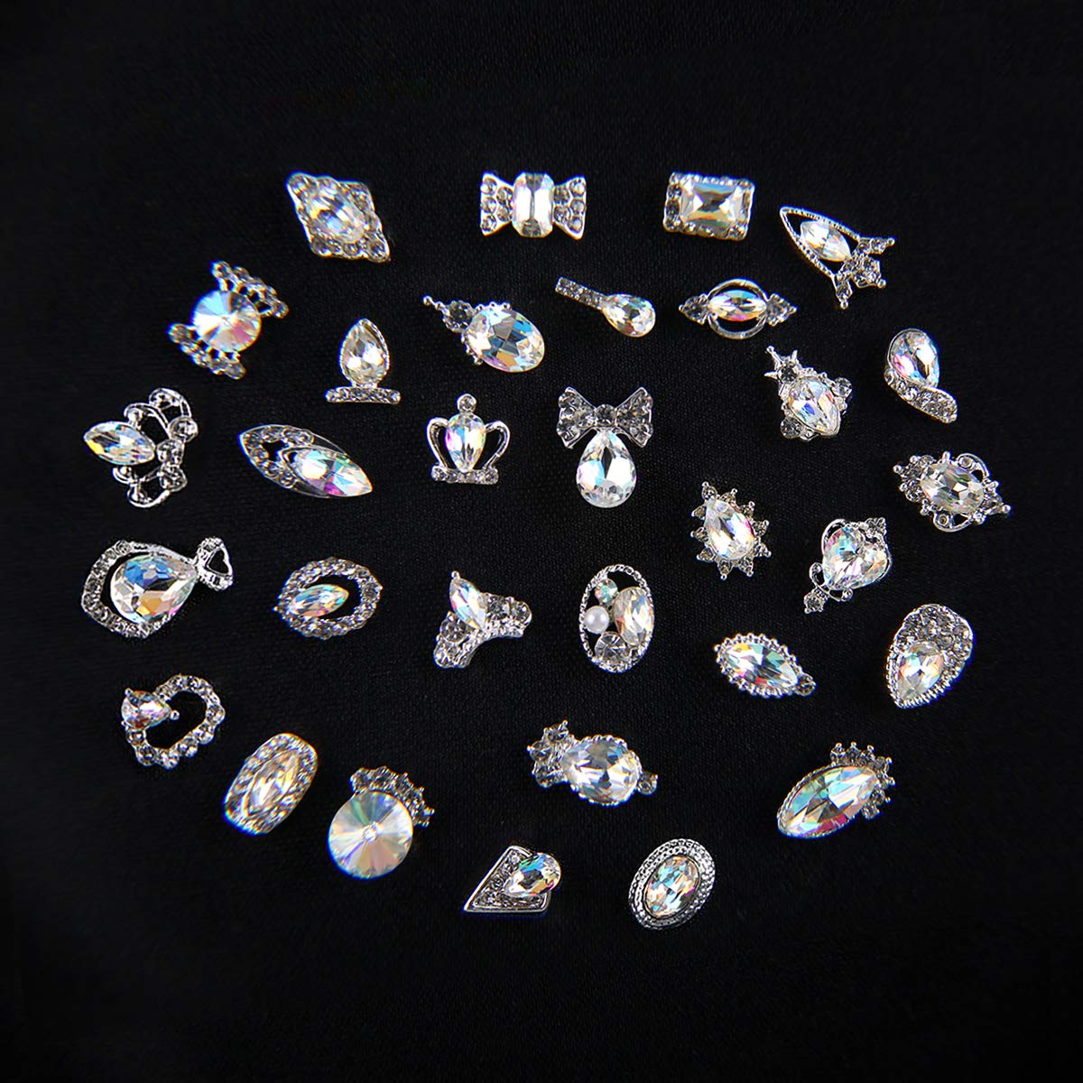 YOOCUS nail art diamonds curved-base design enhances fitting on natural or acrylic nails.