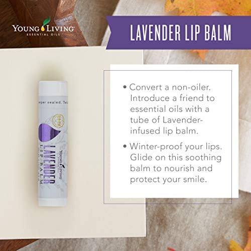 Young Living Lavender Lip Balm in hand emphasizes portable lip care for daily use.