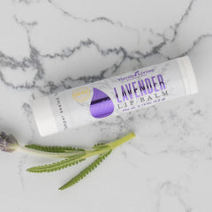 Young Living Lavender Lip Balm on lips demonstrates softening hydration and moisture retention.