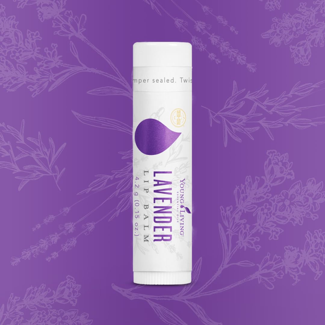 Young Living Lavender Lip Balm tube closeup highlights smooth easy application and calming lavender aroma.
