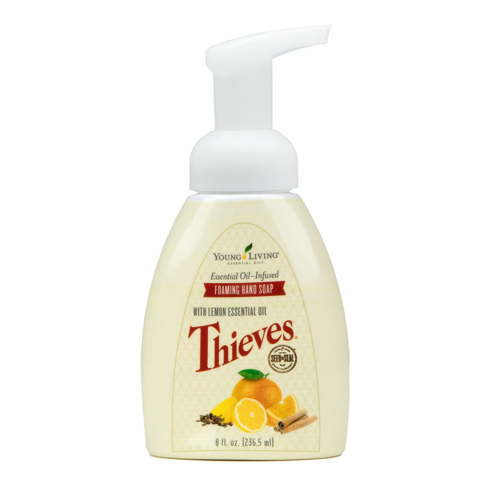 Young Living Thieves foaming hand soap bottle showing gentle daily cleaning in action