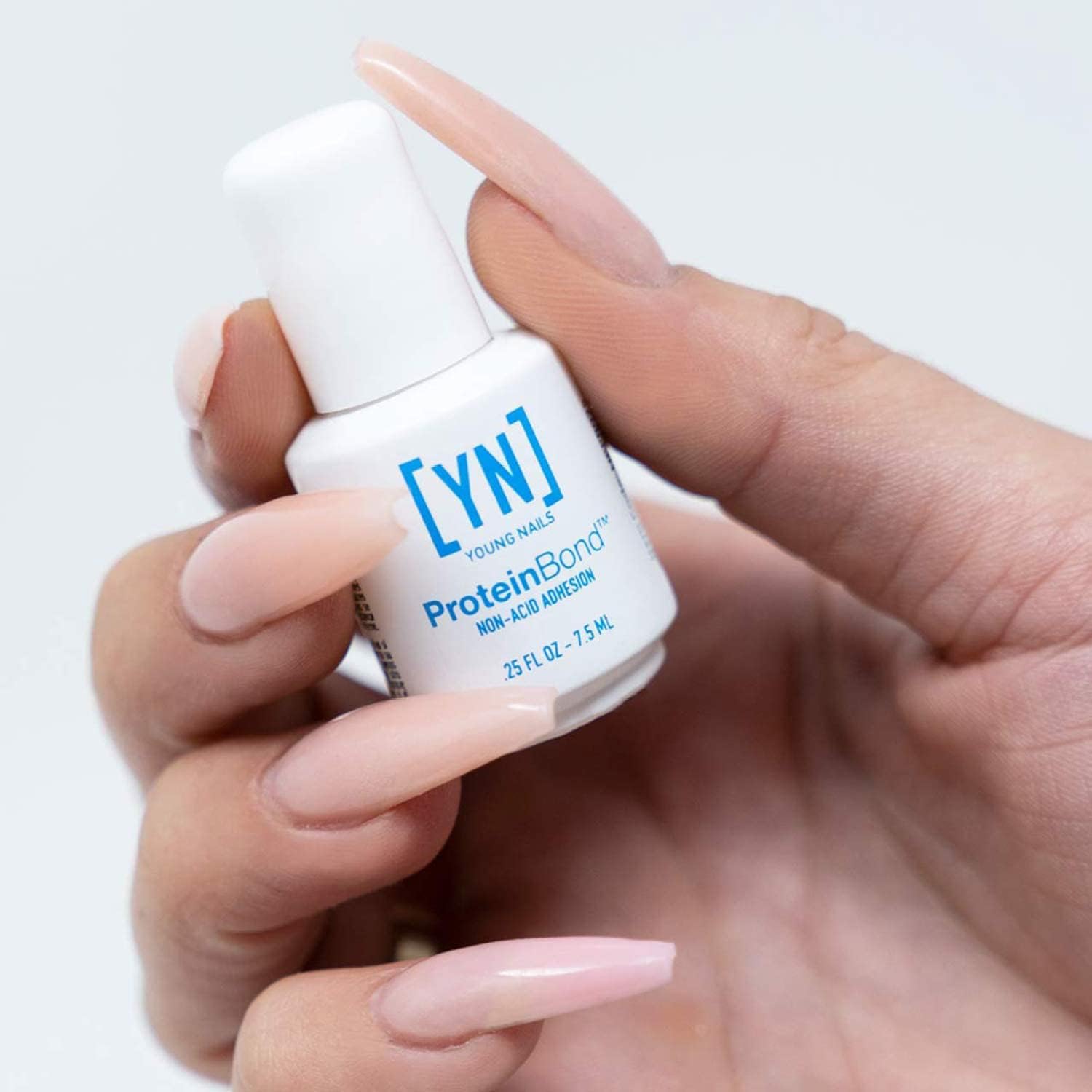 Young Nails Nail Protein Bond application on nail — anchors gel and acrylic securely
