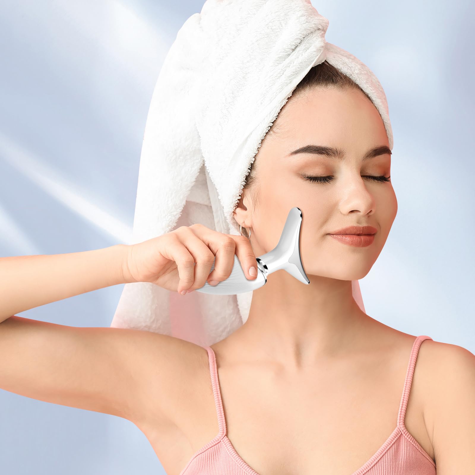 YourMate face-neck massager side view shows portable design for travel-friendly skincare on the go.