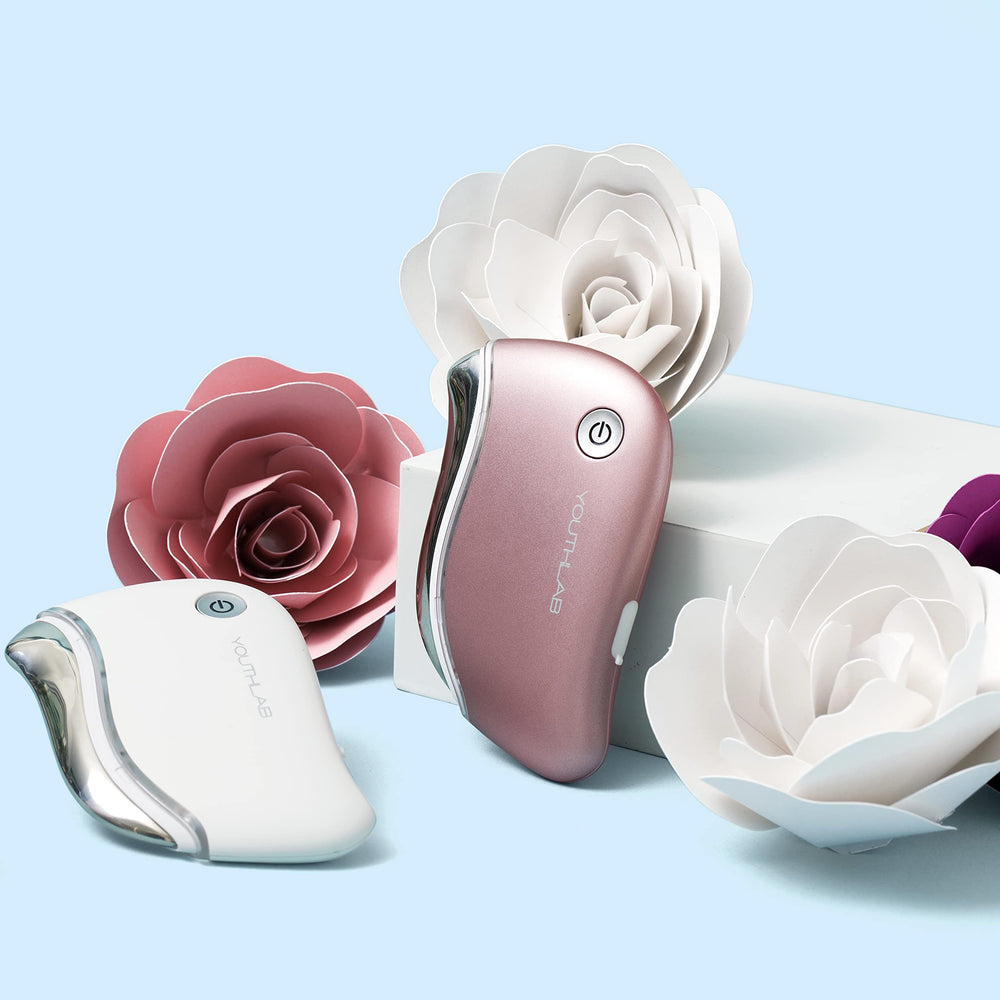 YOUTHLUX ProSculpt compact massager in white for travel skincare