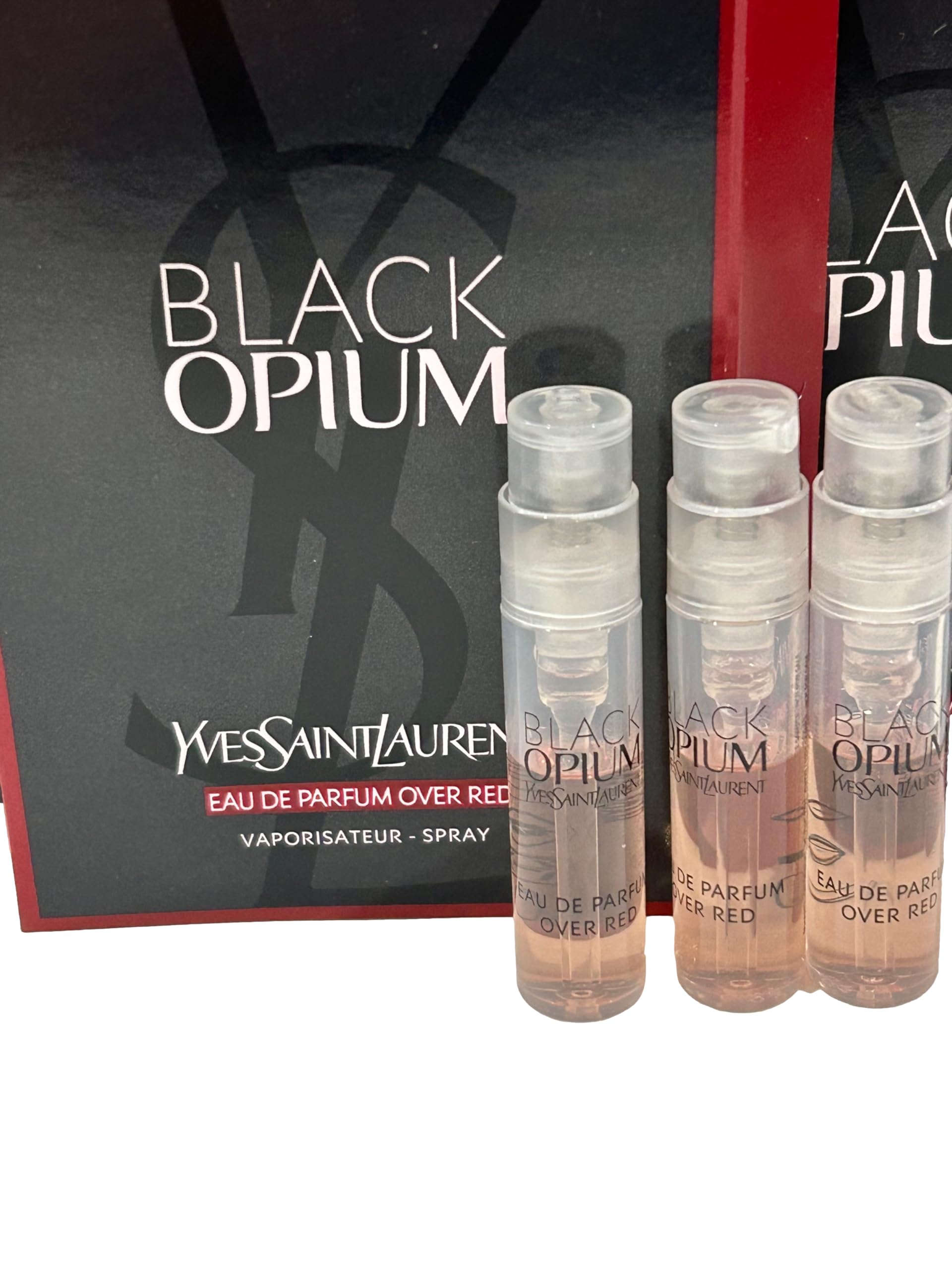 YSL Black Opium 1.2ml mini bottles offer portable EDP for on-the-go scent.