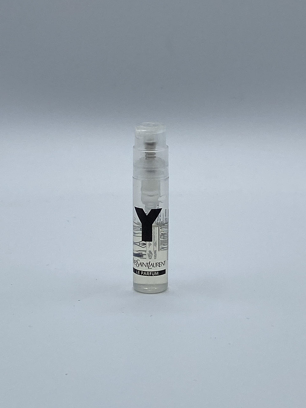 Yves Saint Laurent Y for Men bottle label close-up highlighting premium branding and scent promise.