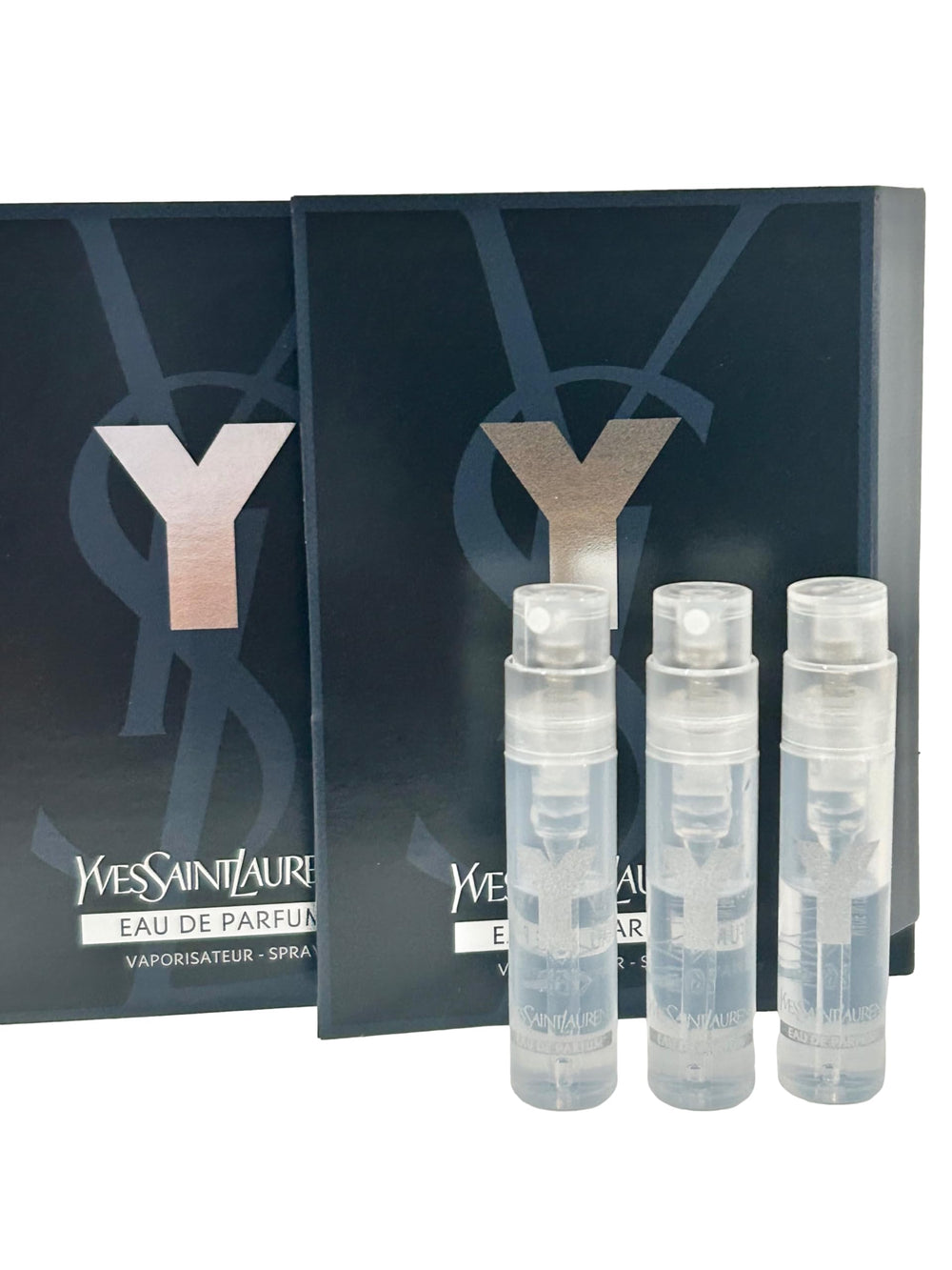 Close-up of YSL Y Men EDP spray bottle: ideal for quick application and travel.