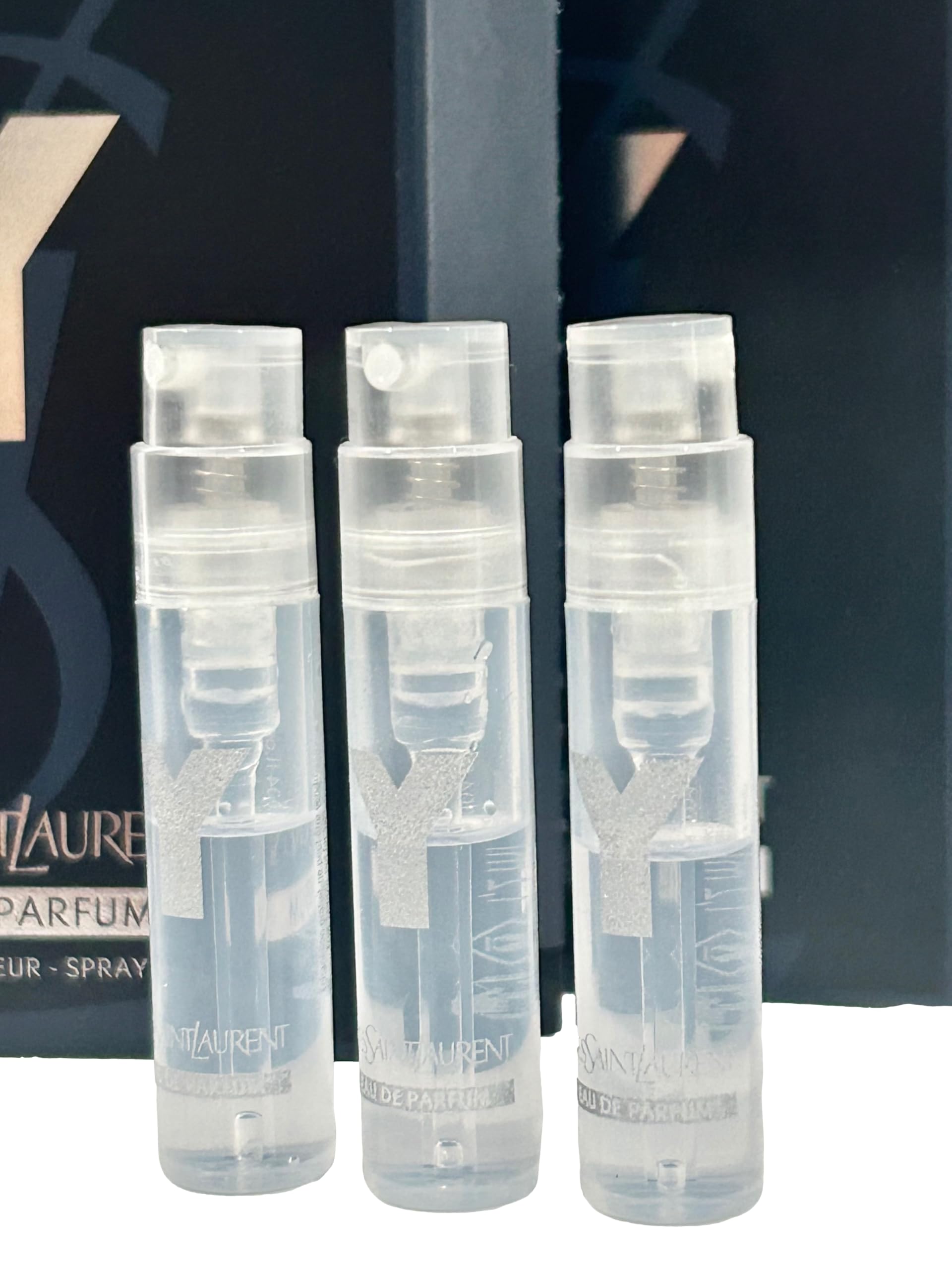 Display of YSL Y Men EDP vials: easy-to-test scents before purchasing.