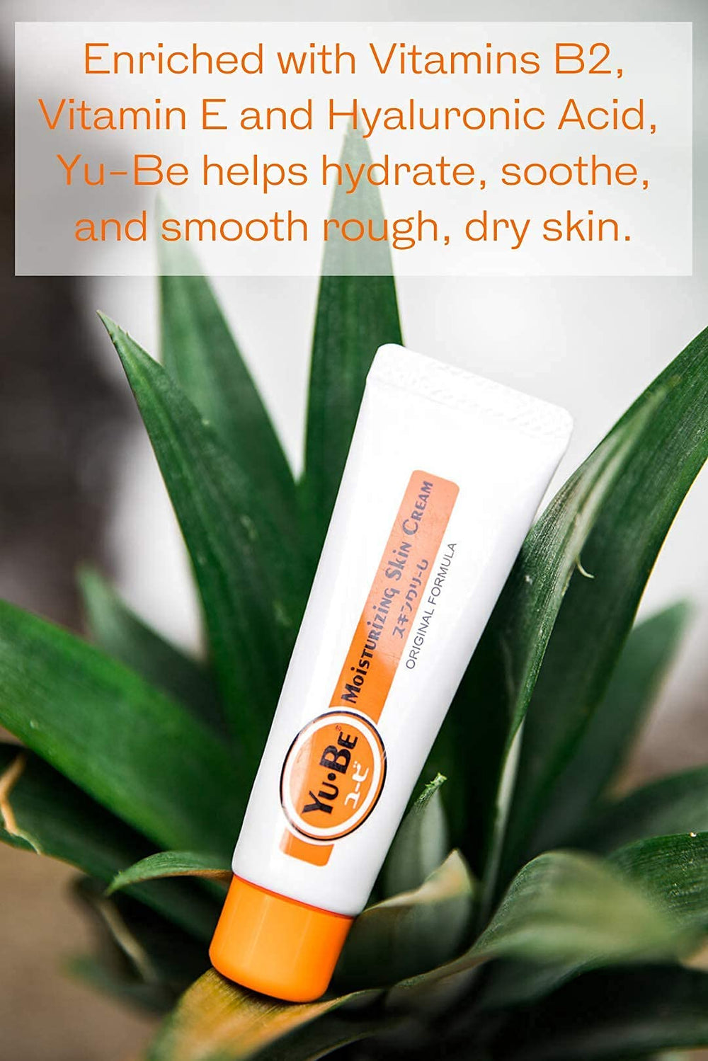 Yu-Be Moisturizing Skin Cream hands-application demonstrates versatile use on hands and dry patches.