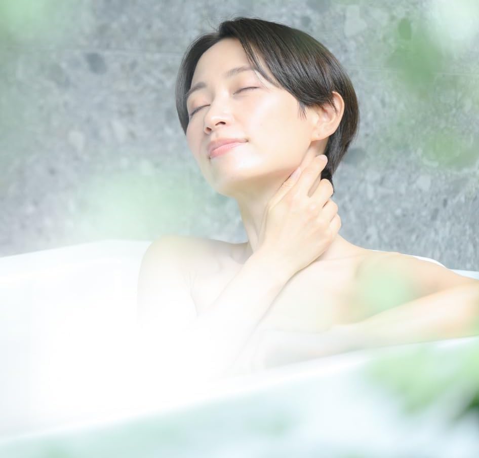 Yuzu Onsen Bath Salt glow reveals golden bath water and relaxing ambiance.