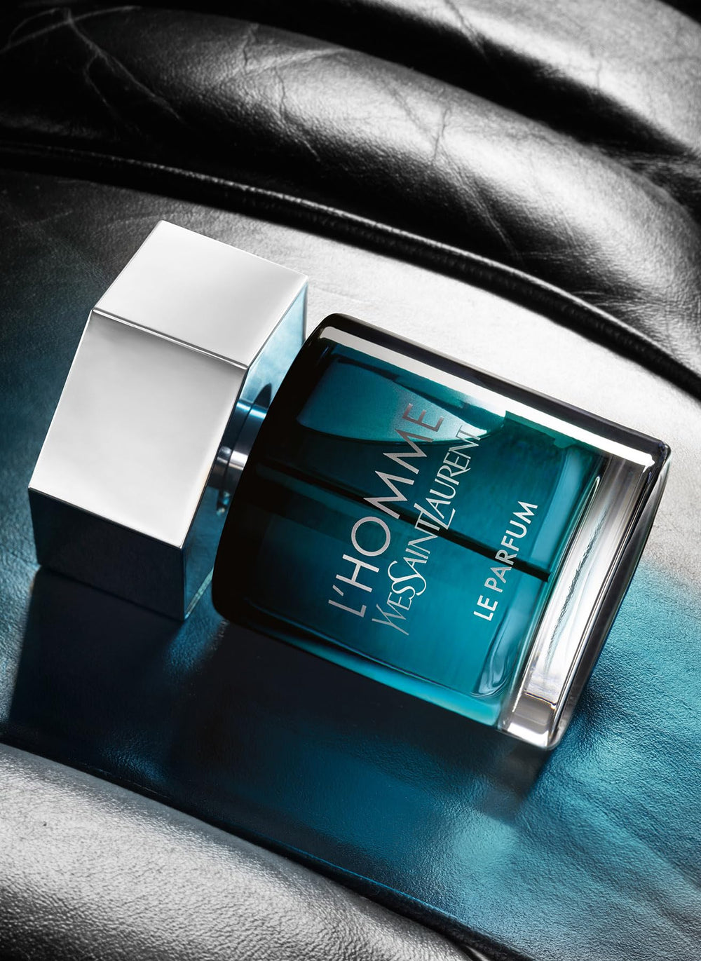 YSL LHomme Le Parfum application gesture suggesting precise spray for refined daywear