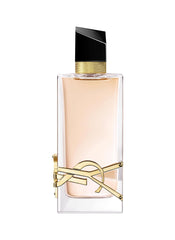 YSL Libre bottle closeup shows amber-vanilla warmth for daily wear.
