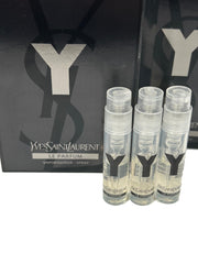 YSL Y Men travel-size spray bottle for on-the-go fragrance touch-ups.