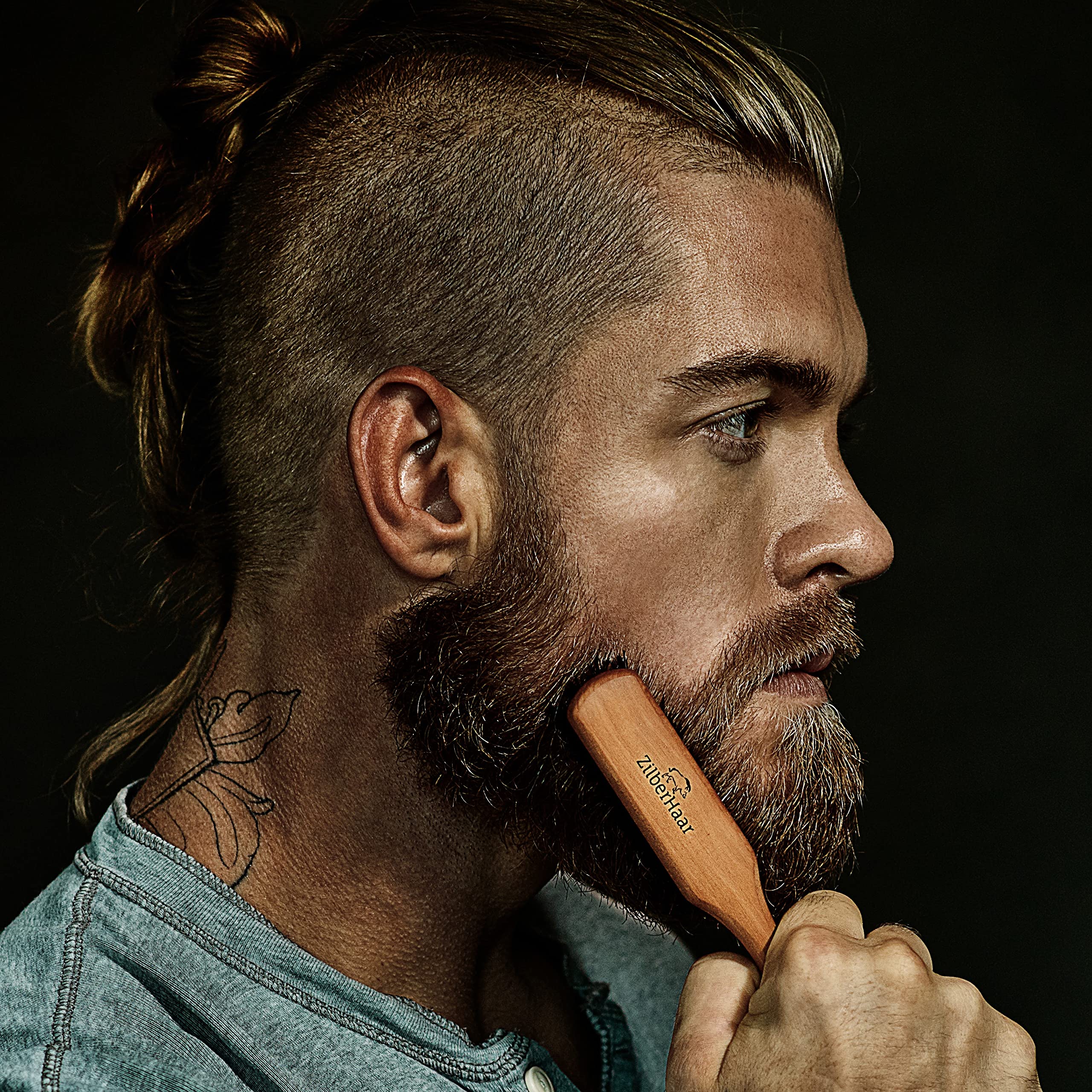 ZilberHaar 6-inch brush shown in hand for precise grooming.