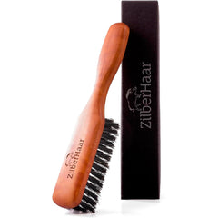 ZilberHaar beard brush with wood handle distributes oil evenly for grooming.