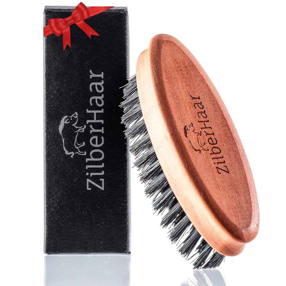 ZilberHaar pocket mustache and beard brush in pearwood close-up, ideal for travel touch-ups.