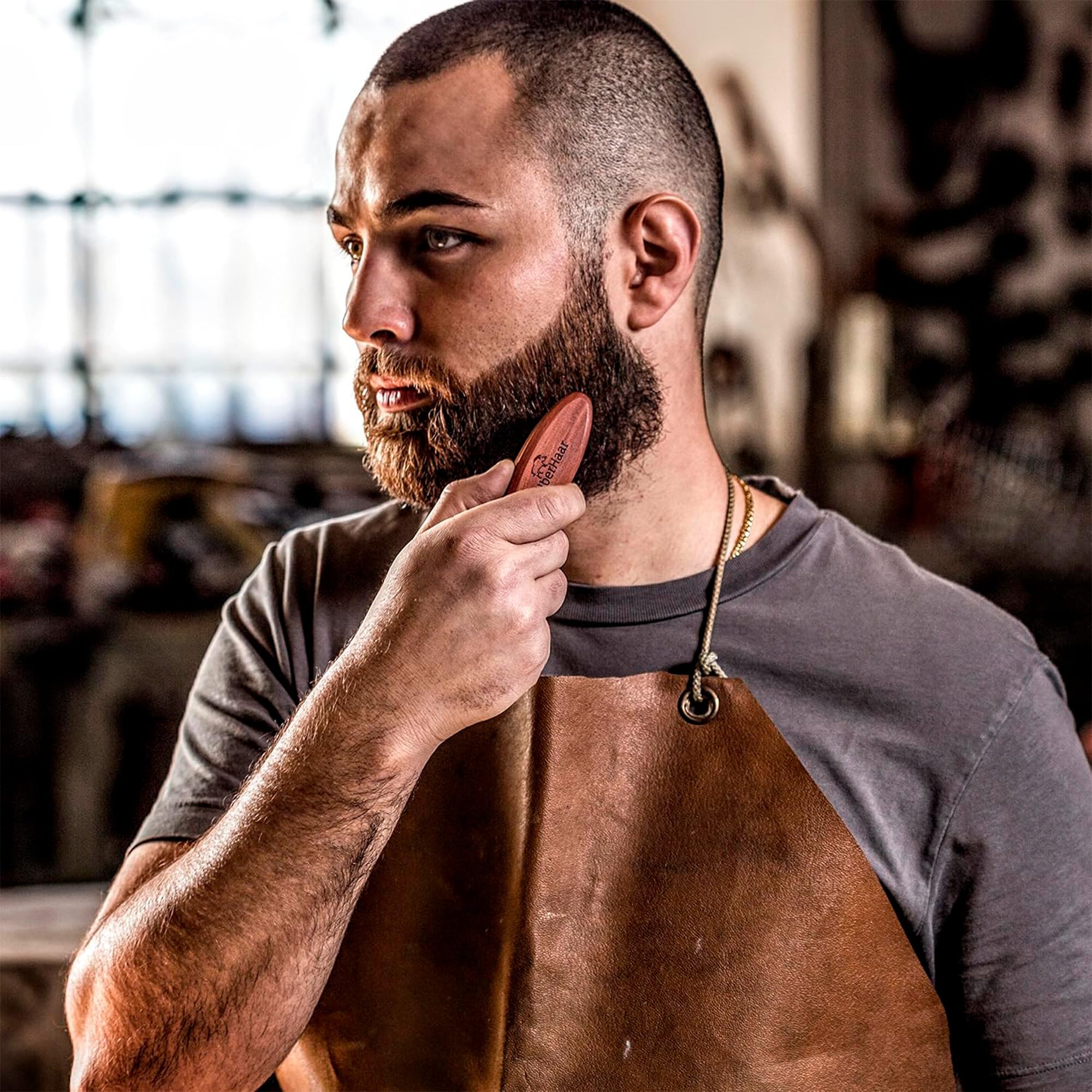 ZilberHaar travel-friendly beard brush in compact size, easy to stow in pockets or bags.