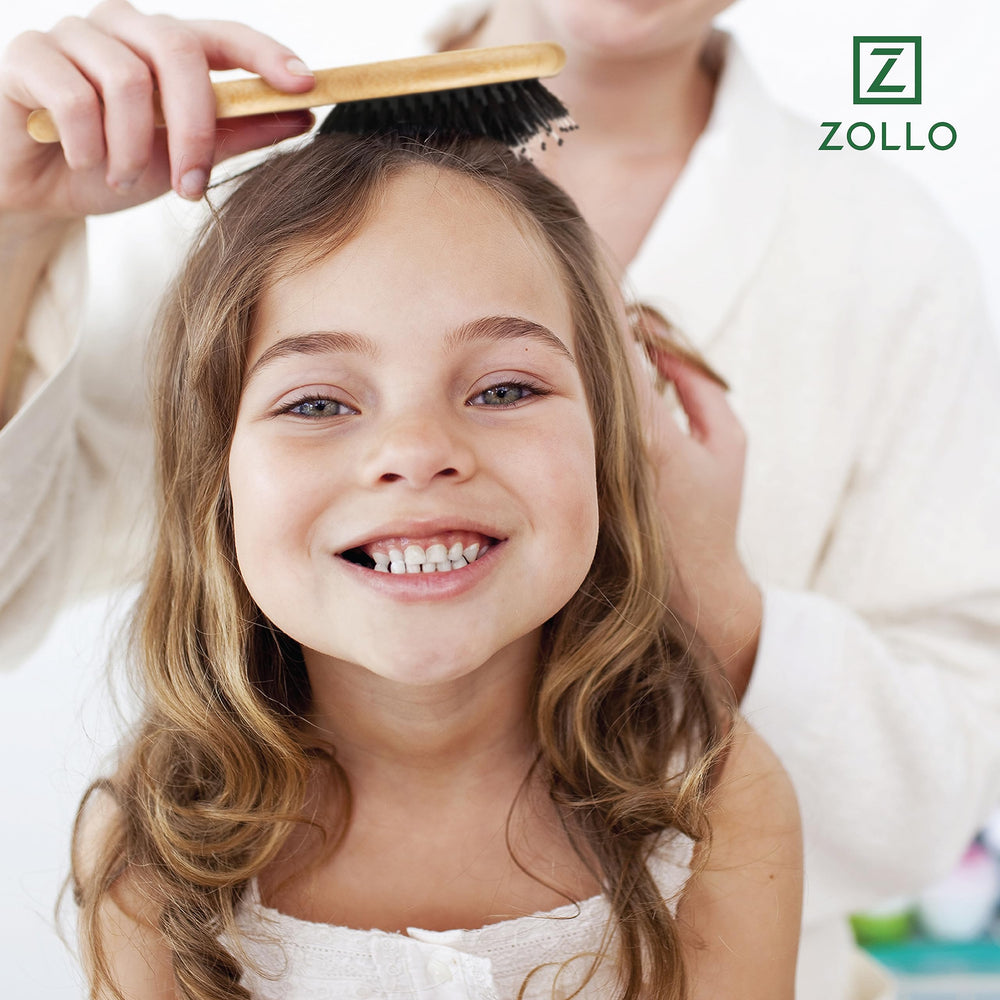 Zollo all-hair-types mini brush supports detangling from straight to curly.