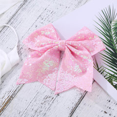Zolyco 7inch pink cheer bow on bun adds dramatic flair