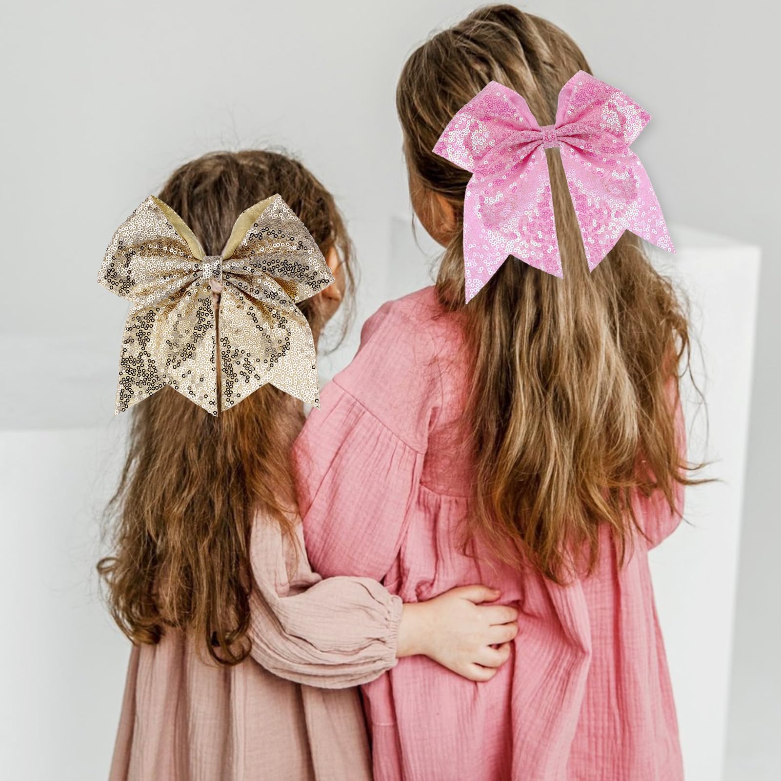 Zolyco 7inch pink cheer bow pony-tail demonstrates versatile hair styling option