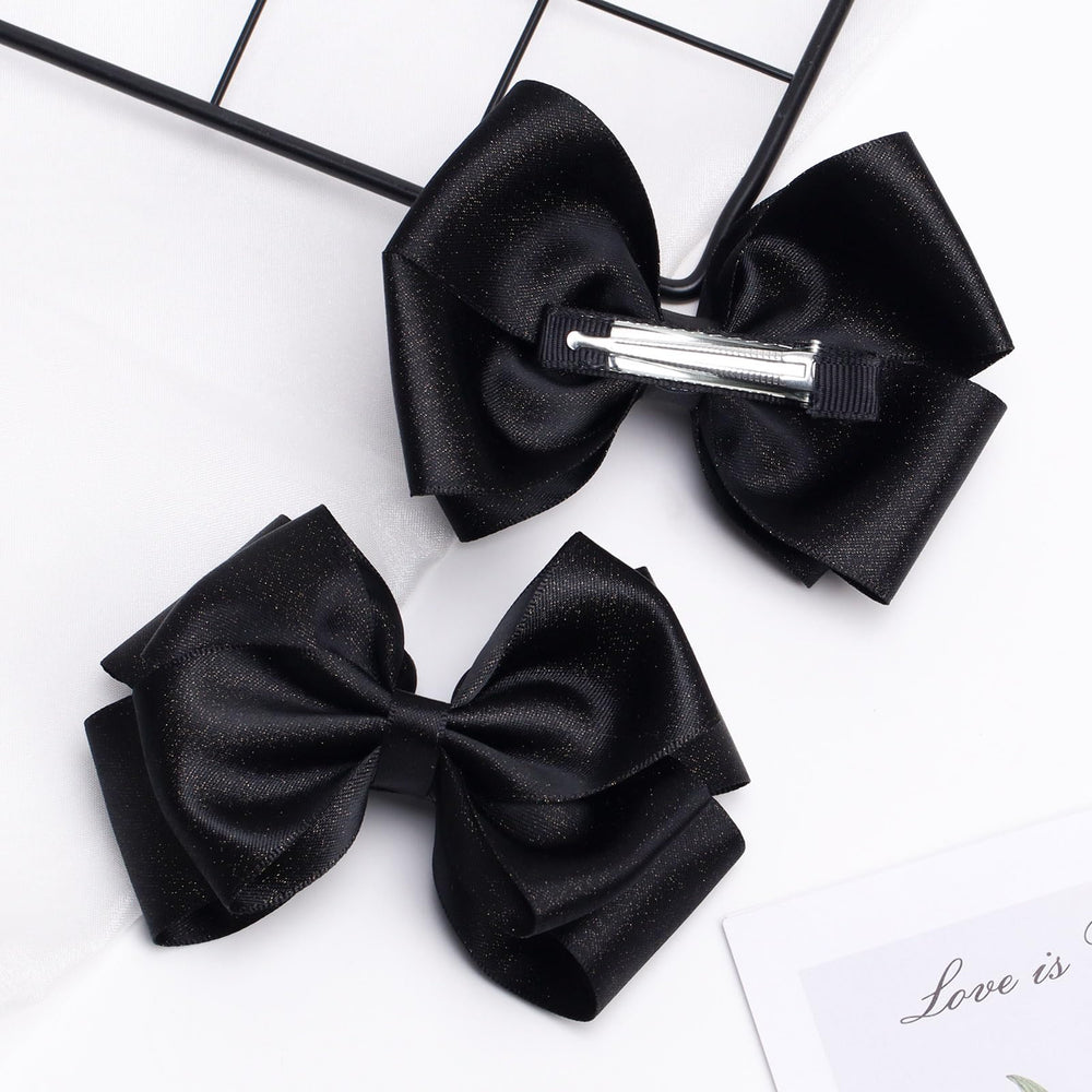 Zolyco bow clip in use for a kid's ponytail look.