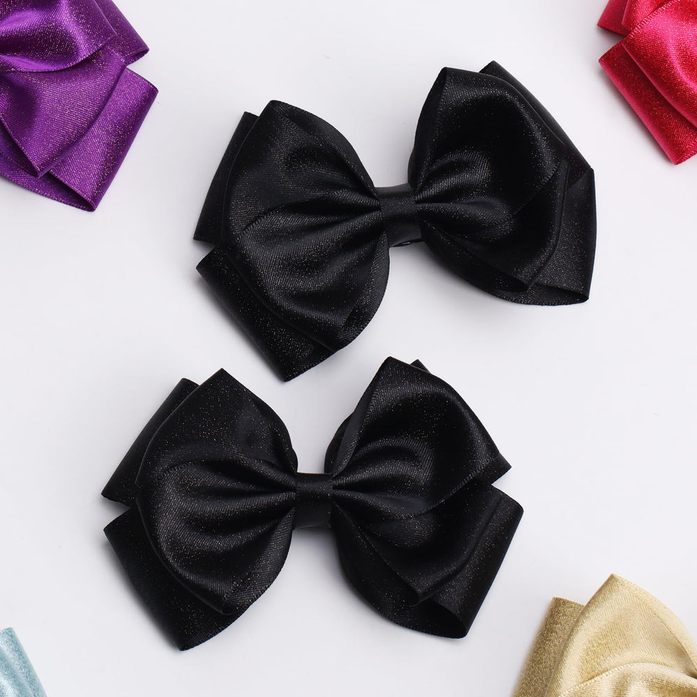 Zolyco bow clip with half-wrap edge protects hair during wear.