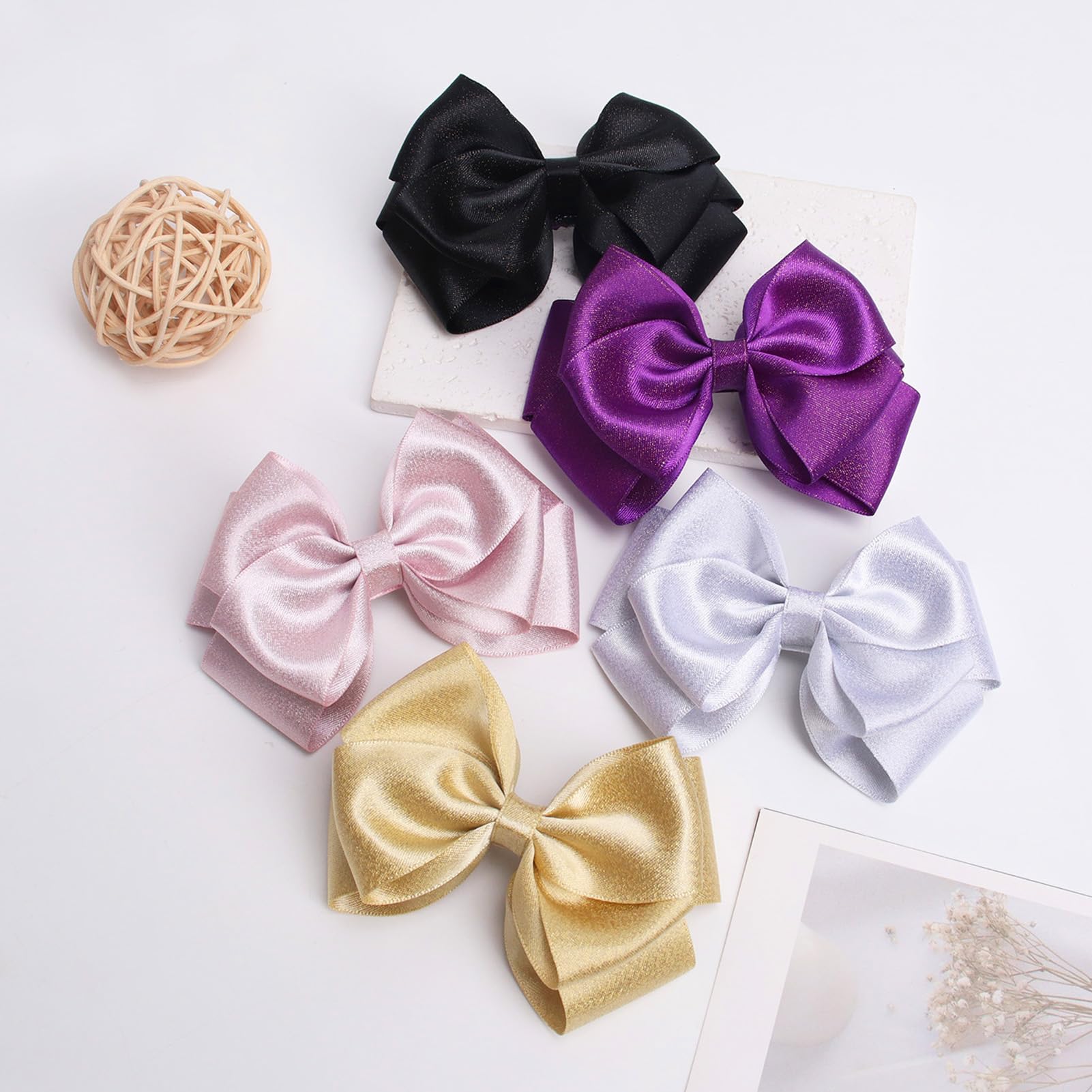 Zolyco black satin bow clip ideal for photos and parties.