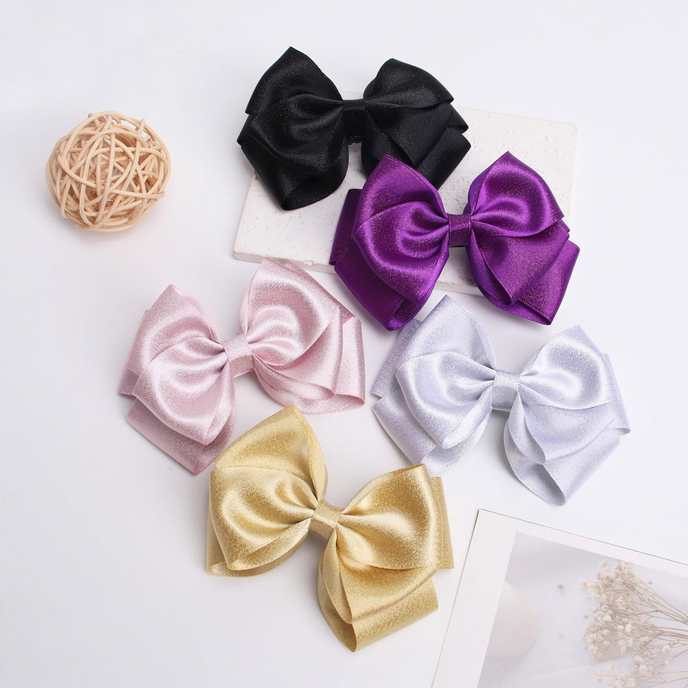Zolyco black satin bow clip ideal for photos and parties.