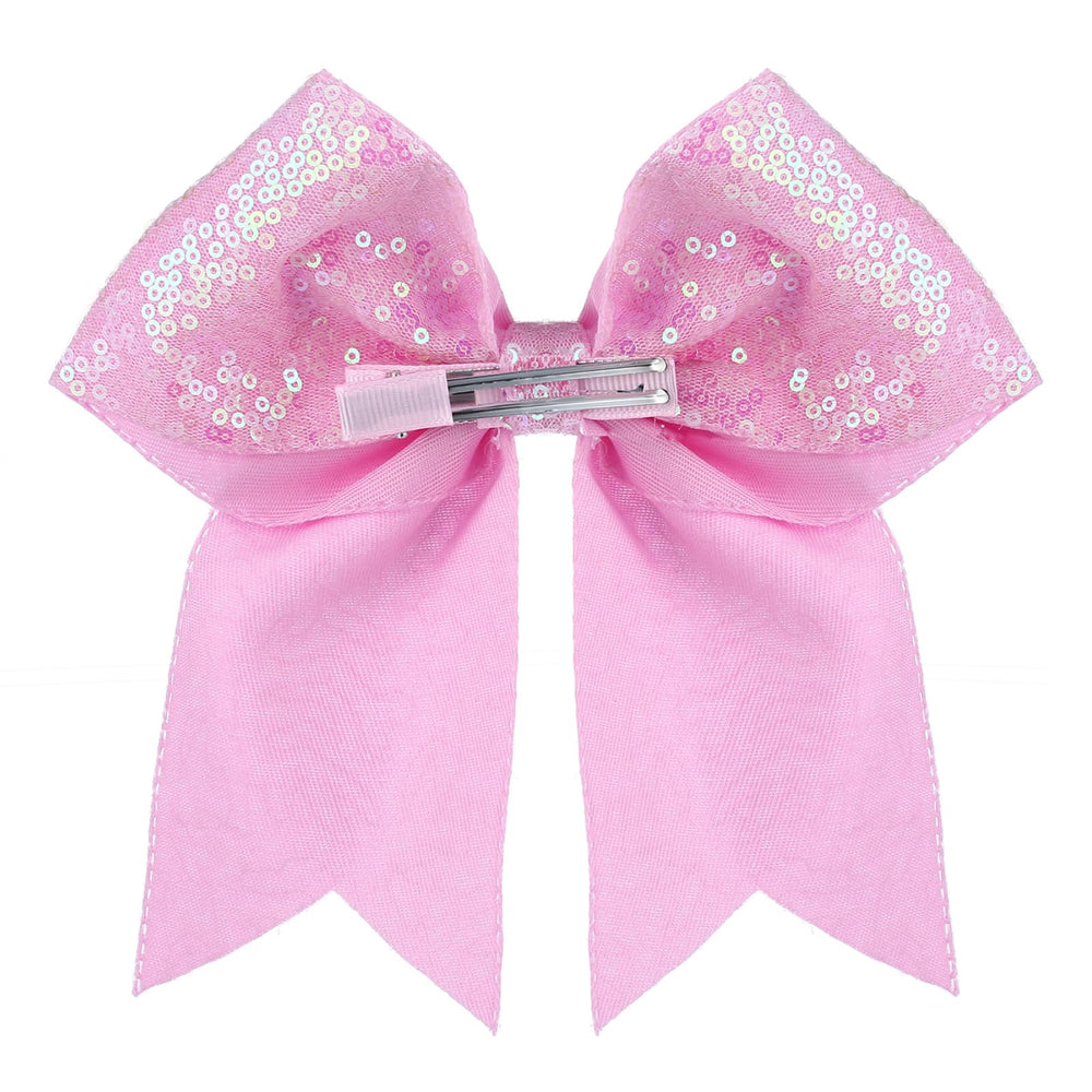 Zolyco pink bow displayed in packaging indicates ready-to-wear appeal